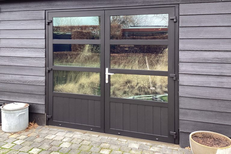 openslaande garagedeur van glas